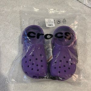 Neon purple crocs. Men size 4, womens size 6